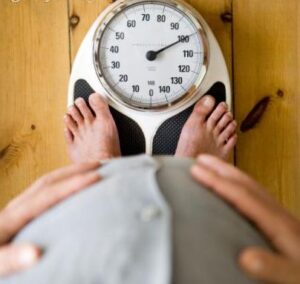 weighing scale fat man